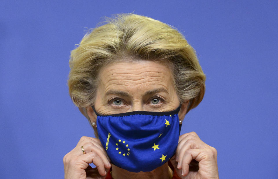 European Commission President Ursula von der Leyen adjusts her facemask ahead of delivering a statement ahead of the first day of a European Union (EU) summit at The European Council Building in Brussels on October 1, 2020. (Photo by JOHANNA GERON / POOL / AFP) (Photo by JOHANNA GERON/POOL/AFP via Getty Images)