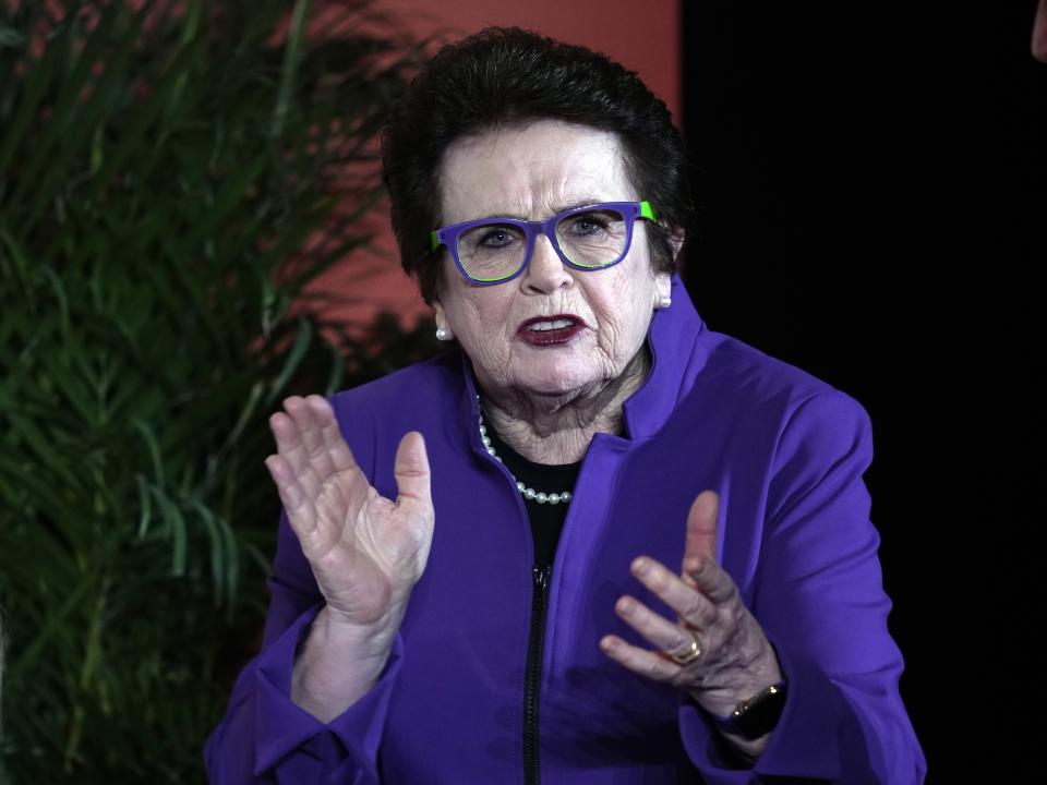 Former U.S. tennis champion Billie Jean King claps as she walks on the stage during the International Women's Day in Abu Dhabi, United Arab Emirates, Wednesday, March 8, 2023. (AP Photo/Kamran Jebreili)
