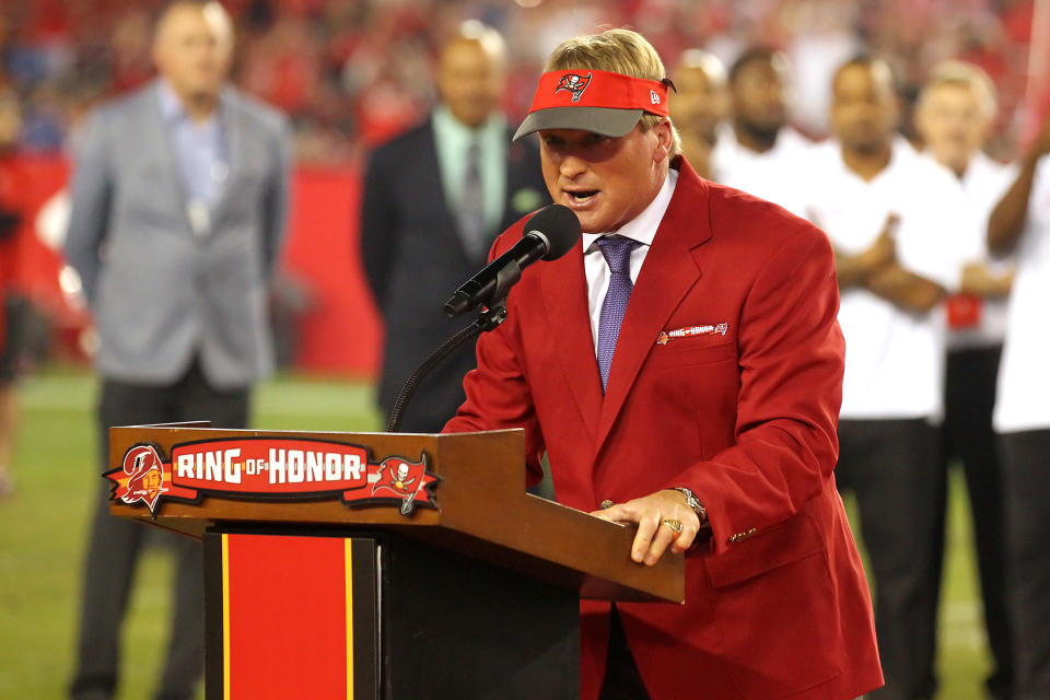 TAMPA, FL - DEC 18: MNF announcer and former Tampa Bay Buccaneers Super Bowl winning head coach Jon Gruden speaks to the fans as he is Inducted into the Buccaneers Ring of Honor during the regular season game between the Atlanta Falcons and the Tampa Bay Buccaneers on December 18, 2017 at Raymond James Stadium in Tampa, Florida. (Photo by Cliff Welch/Icon Sportswire via Getty Images)