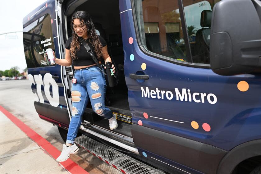 Los Angeles, California August 11, 2023-Ana Castro rides a Metro Micro van to her job in South Los Angeles. (Wally Skalij/Los Angeles Times)