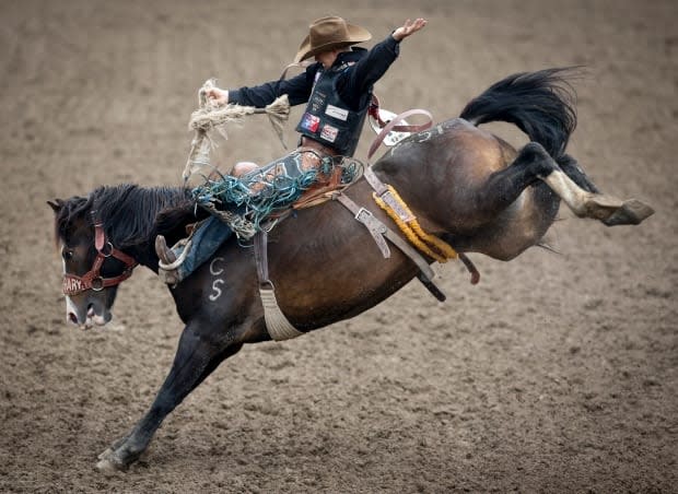 Zeke Thurston rides Peigan Warrior in the saddle bronc event at the 2019 Calgary Stampede. Despite the pandemic, the sport has been slowly coming back to life in 2021 — but there's concern a recent, rogue event could threaten that. 