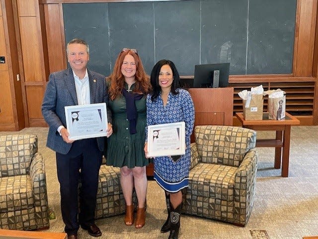State Reps. Claudia Ordaz (right) Brad Buckley pose for a photo with Texas Humane Legislation Network Executive Director Shelby Bobosky during an event Saturday, April 13, 2024. Ordaz and Buckley were recognized by the group for their work on animal welfare issues.