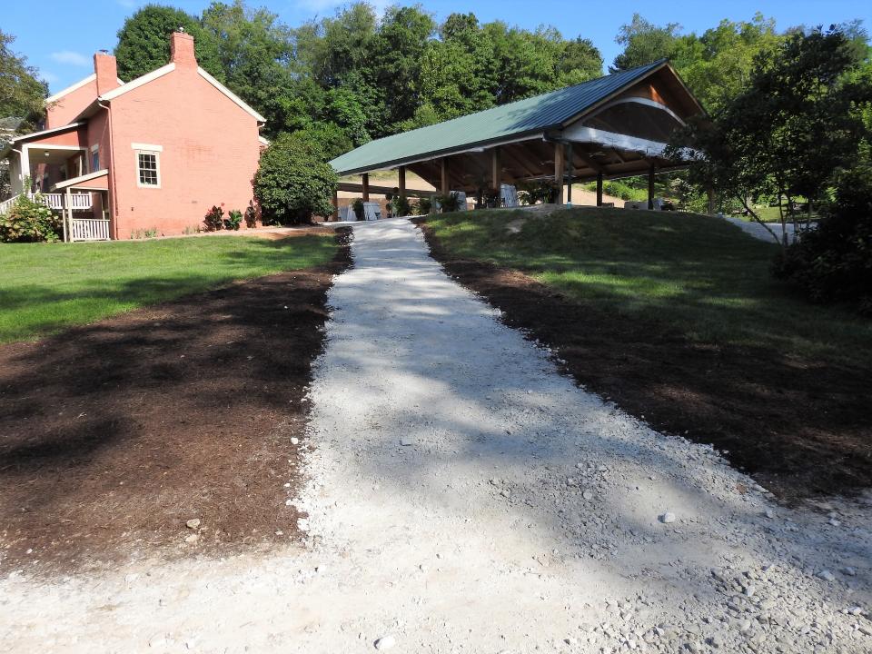 An improved walkway for better handicapped accessibility has been added going up to the events pavilion at Clary Gardens. It's part of phase one of a project that is also seeing completion of a pond with waterfall.