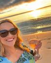 <p>It would be hard not to be this happy when you're having a sunset sip beachside, as <a href="https://people.com/tag/reese-witherspoon/" rel="nofollow noopener" target="_blank" data-ylk="slk:Witherspoon;elm:context_link;itc:0;sec:content-canvas" class="link ">Witherspoon</a> can attest.</p>