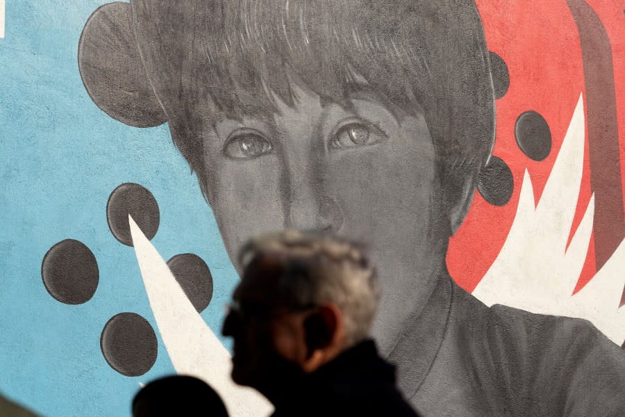 Attorney General Merrick Garland tours murals of shooting victims, Wednesday, Jan. 17, 2024, in Uvalde, Texas. The Justice Department is planning this week to release findings of an investigation into the 2022 school shooting. (AP Photo/Eric Gay)