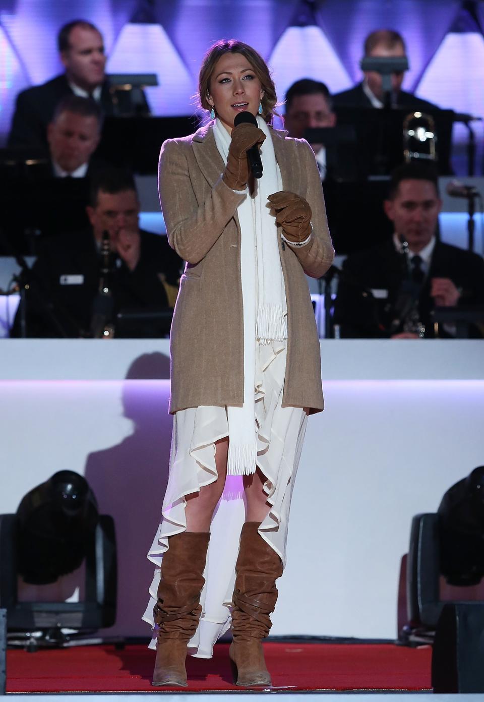 WASHINGTON, DC - DECEMBER 06: Singer and songwriter Colbie Caillat sings during the annual lighting of the National Christmas tree on December 6, 2012 in Washington, DC. This year is the 90th annual National Christmas Tree Lighting Ceremony. (Photo by Mark Wilson/Getty Images)