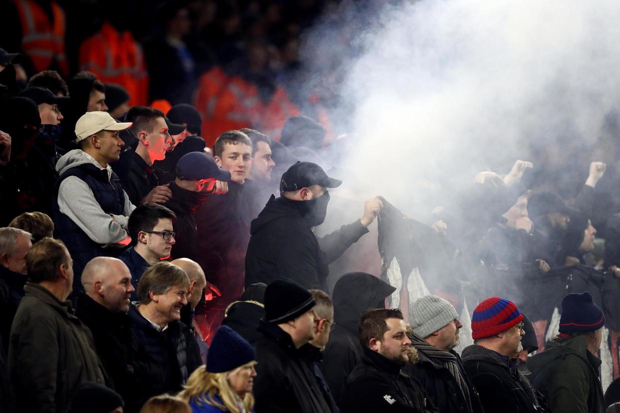 Out of order: Palace supporters let off a flare at the Amex during last week’s 0-0 draw: Getty Images