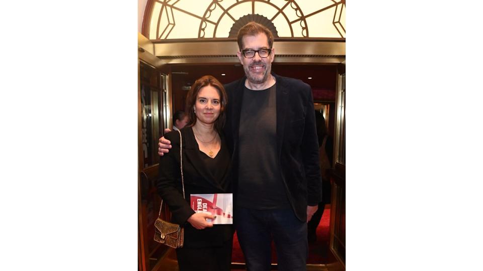 Richard Osman with his arm around Ingrid Oliver