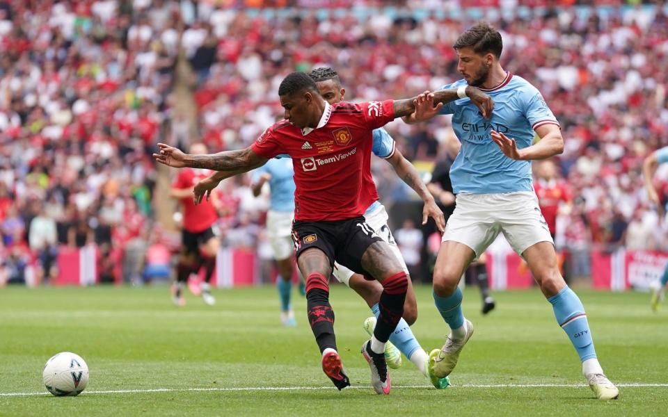 Ruben Dias - Getty Images/Adam Davy