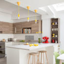 <p> Smart kitchen lighting ideas can make a big impact to a kitchen's look and feel. </p> <p> Ideally, you should have task lights, such as spotlights, over the worktops; halogen bulbs on the extractor; and overhead lighting with ambient light in a dining area. Always use a qualified electrician for anything complicated – visit the Electrical Contractors' Association to find one in your area. </p>