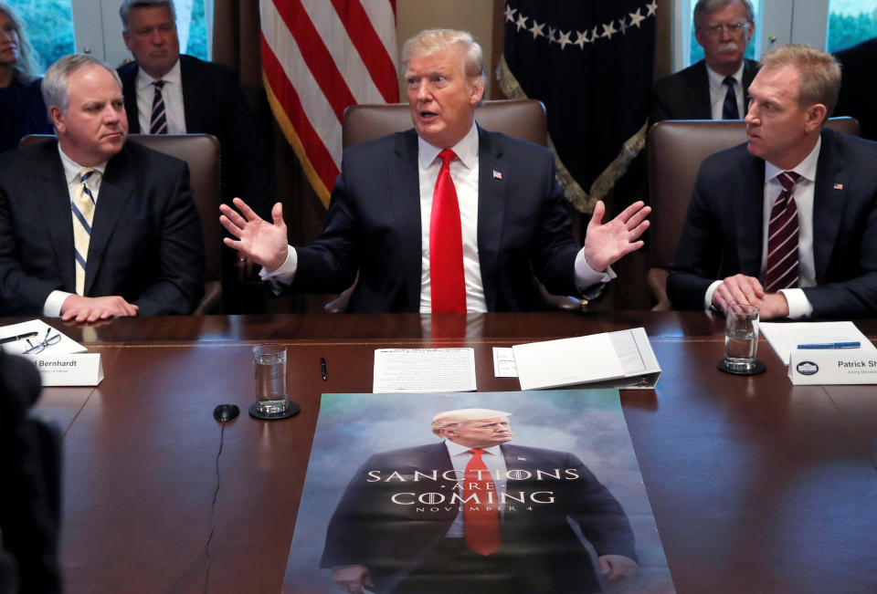 U.S. President Donald Trump, Acting U.S. Defense Secretary Patrick Shanaha n,and Acting Secretary of the Interior David Bernhardt attend a Cabinet meeting on day 12 of the partial U.S. government shutdown at the White House on Jan. 2 (Photo: REUTERS/Jim Young)