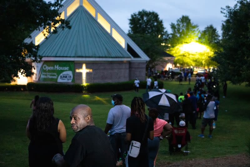 Voters line up to cast their ballots in Atlanta