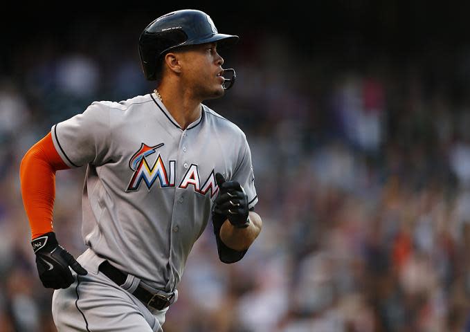 Giancarlo Stanton loves him some Coors Field. (AP)