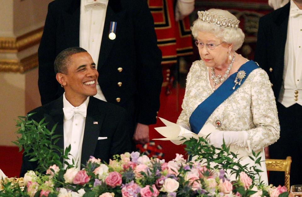 Queen Elizabeth speaks next to President Barack Obama during a State Banquet (REUTERS)