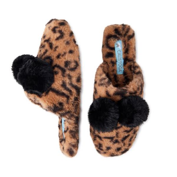 Credit: <a href="http://goto.walmart.com/c/2055067/565706/9383?subId1=intheknow&subId2=fuzzyslipperssweldon&subId3=calistogapompomslippers&veh=aff&sourceid=imp_000011112222333344&u=https%3A%2F%2Fwww.walmart.com%2Fip%2FCalistoga-Women-s-Fuzzy-Pom-Pom-Mule-Slippers%2F847713738" rel="nofollow noopener" target="_blank" data-ylk="slk:Walmart;elm:context_link;itc:0;sec:content-canvas" class="link ">Walmart</a>