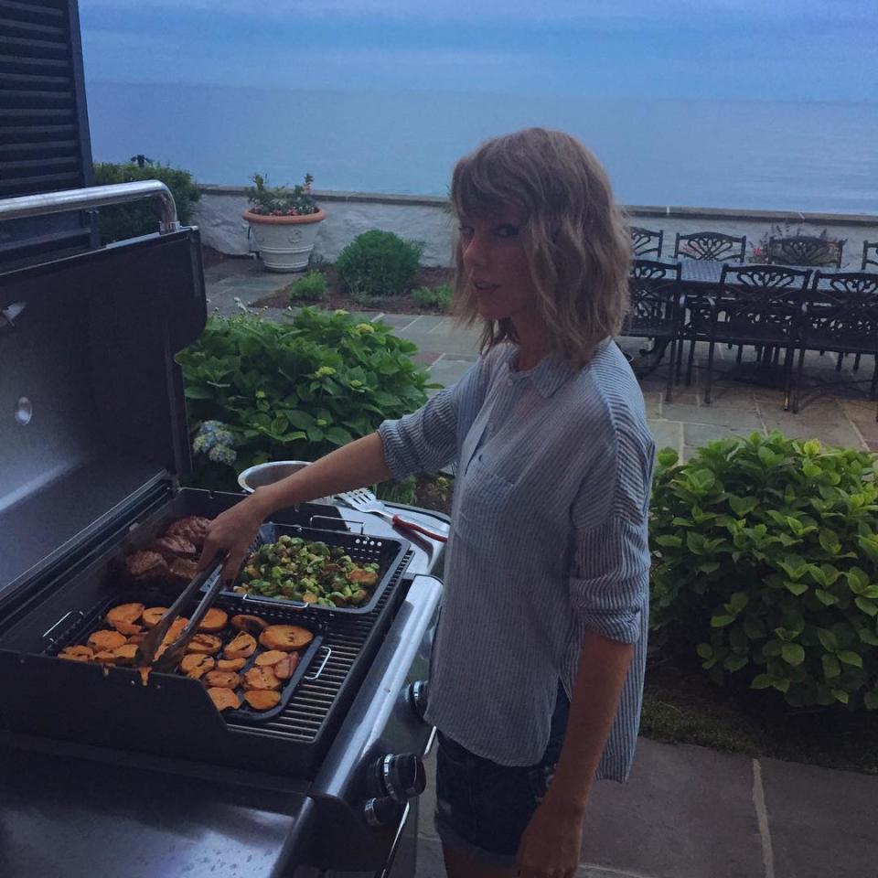 The couple that cooks together... stays together? If hunky music-maker Calvin Harris' first Instagram of his superstar girlfriend is any indication, this power couple won't end up being just another sad breakup song. In the pic, a sweet-and-sexy looking Swift gets into the Fourth of July spirit as she mans the grill, where she's barbecuing something that can't possibly be as delicious as these two lovebirds. "She cooks too," the DJ gushed in the captioned photo posted late Thursday night. <strong> WATCH: Taylor Swift and Calvin Harris Named Forbes' Highest Paid Celebrity Couple </strong> Harris' flame emojis were certainly a nice (and festive!) touch, but it's been clear since April that the figurative fireworks have been flying between the 31-year-old Scottish stud and his multi-talented boo. More proof their relationship is on fire: Recently, Harris cat-sat for for the 25-year-old "Shake It Off" singer as she trekked to Europe for her <em>1989 World Tour</em>. That can only mean one thing: #Trust. Harris has become Swift's own personal cheerleader in recent weeks, and not just when it comes to her cooking. After Swift convinced Apple to change its policy with an open letter regarding the company's new streaming service, Harris praised her, tweeting, "my girl just changed the entire music industry." I just played a gig inside a giant owl and my girl just changed the entire music industry what a day— Calvin Harris (@CalvinHarris) June 22, 2015 <strong> WATCH: Taylor Swift Gives Calvin Harris a Subtle Shout-Out </strong> Already feeling nostalgic over the Harris-Swift love story? Reminisce with the video below: 