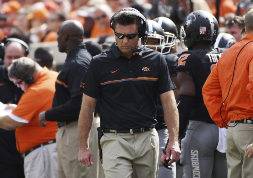 Oklahoma State and coach Mike Gundy won't go undefeated (Getty). 