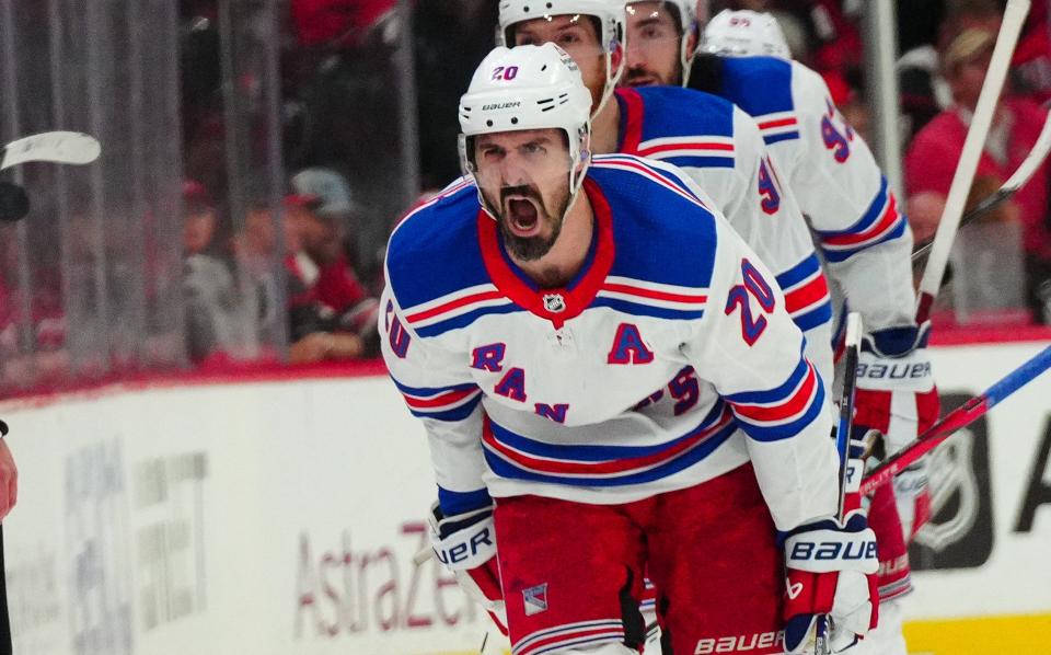 New York Rangers left wing Chris Kreider (20) celebrates his goal against the Carolina Hurricanes during the third period in game six of the second round of the 2024 Stanley Cup Playoffs at PNC Arena. Mandatory Credit: James Guillory-USA TODAY Sports
