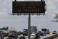 <p>Motorists in Houston pass a sign warning of Hurricane Harvey as the storm intensifies in the Gulf of Mexico, Thursday, Aug. 24, 2017. (Photo: David J. Phillip/AP) </p>