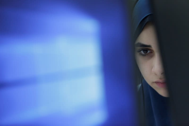 Salsa Quandel, an engineer from Cairo and who works with San Francisco-based software company Wizeline, looks at a computer screen at the company's offices in Guadalajara