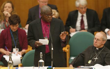 The Archbishop of York, John Sentamu (L), speaks next to the Archbishop of Canterbury Justin Welby at the General Synod in Church House in central London November 20, 2013. REUTERS/Andrew Winning