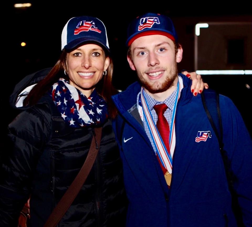 Michigan State goalie Dylan St. Cyr pictured with his mom, legendary goalie Manon Rheaume, after St. Cyr won gold with Team USA at the 2017 U-18 World Championships.