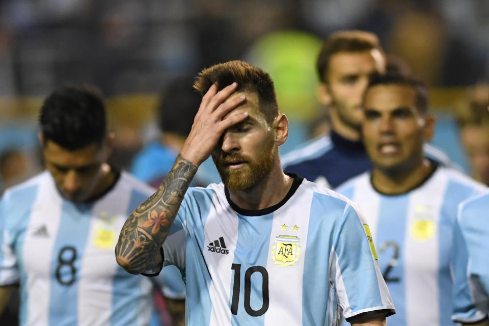 Head in hands: Lionel Messi now needs a football fairytale to ever get his hands on the World Cup