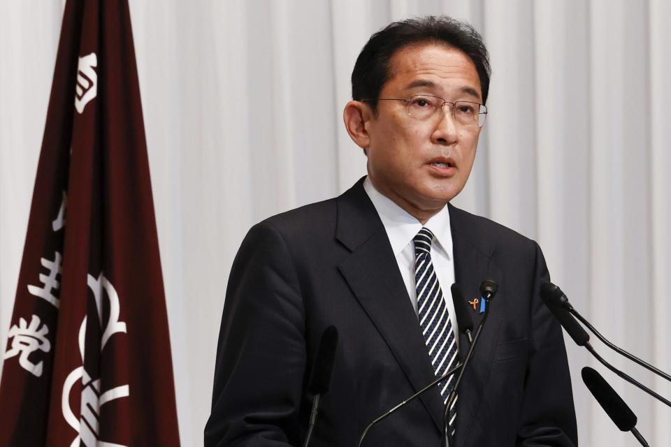 Japan's Prime Minister and ruling Liberal Democratic Party (LDP) leader Fumio Kishida speaks during a news conference at the party headquarters in Tokyo Monday, Nov. 1, 2021. Kishida answered questions from the press after his coalition kept a comfortable majority in Sunday's parliamentary election despite losing some seats. (Rodrigo Reyes Marin/Pool Photo via AP)