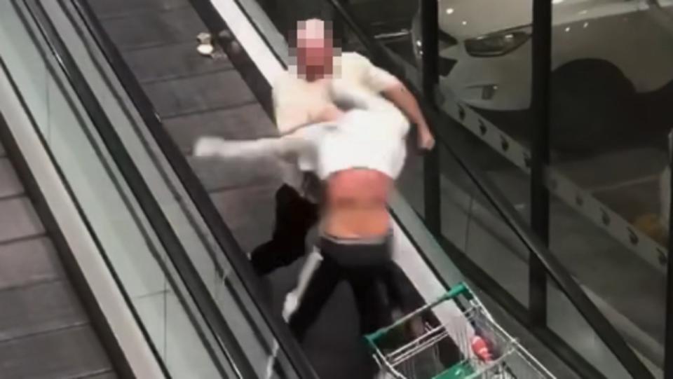 Footage has emerged of two men fighting on a shopping centre escalator in Lake Haven, NSW. Picture: Facebook