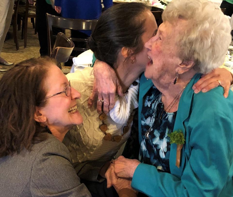 Family friends Peggy, left, and Diane were thrilled to see Mary Warren, right, of Weymouth at her 100th birthday party Saturday, March 18,  at The Common Market in Quincy.