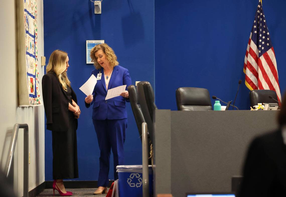 Broward Superintendent Vickie Cartwright, right, speaks to board member Sarah Leonardi at the Broward County School Board meeting on Tuesday, Jan. 24, 2023, in Fort Lauderdale. The board voted unanimously to part ways with Cartwright in a mutual agreement.