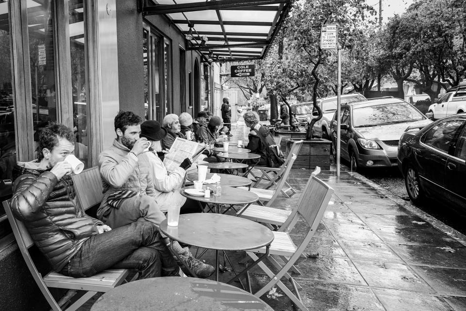 Coffee drinkers at a sidewalk cafe in the north Oakland neighborhood of Rockridge.