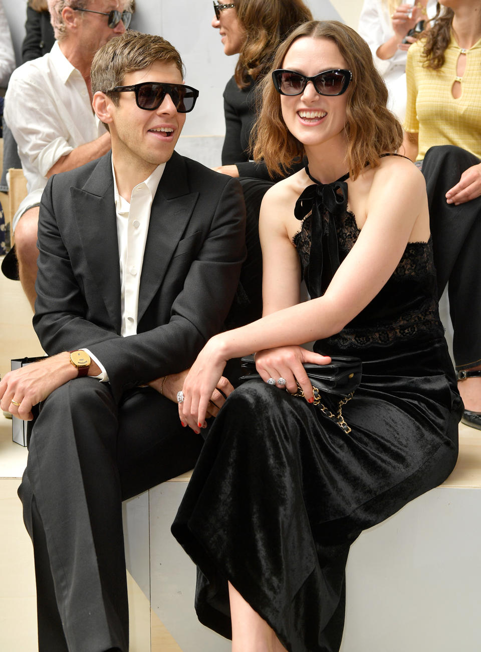 <p>James Righton and Keira Knightley wear complementary black sunglasses to match their all-black ensembles at the Chanel show.</p>