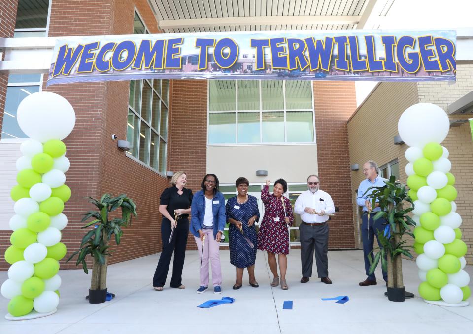 School district officials conduct a ceremonial ribbon-cutting at the new Terwilliger Elementary School in Gainesville in 2021.