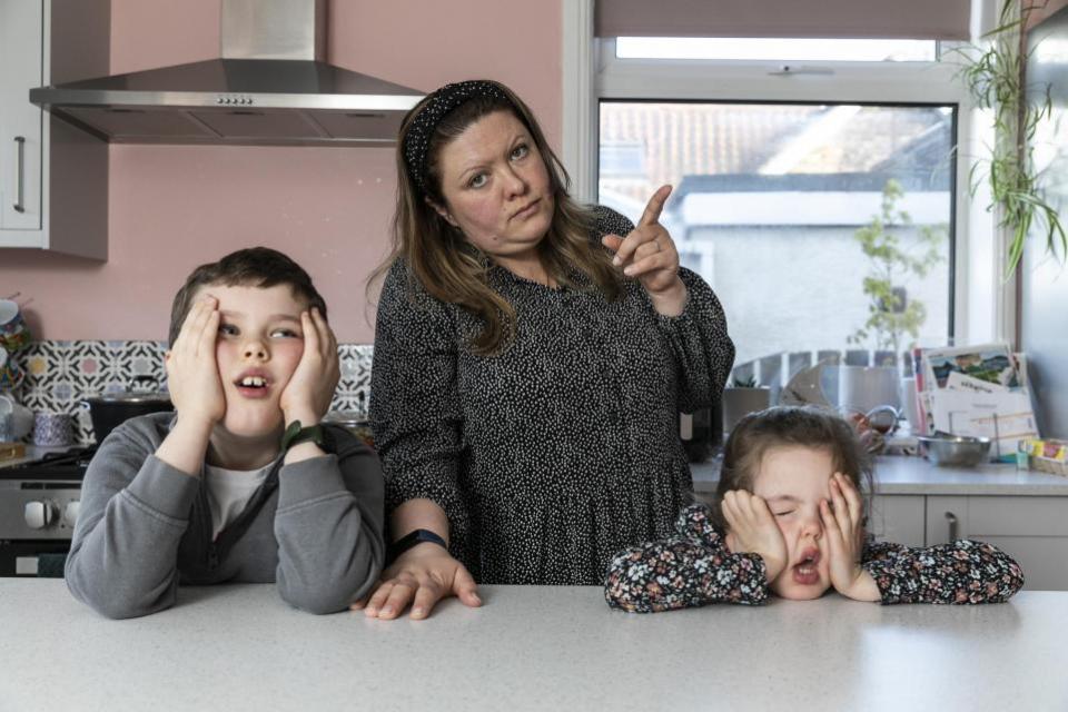 York Press: Elena Leeming, 39, with her two children Violet, five, and Clive, six, pictured at their home in York. Picture: SWNS