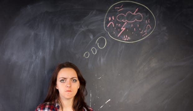 Angry young woman glaring at the camera