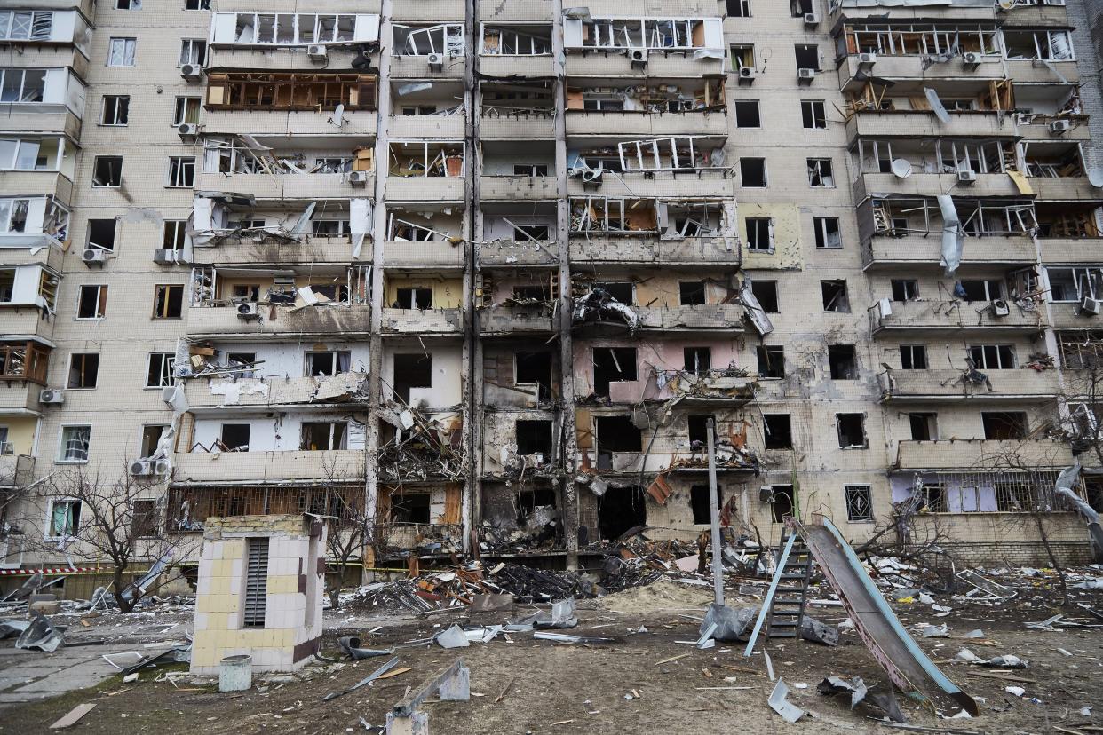 A residential building damaged by a missile on Feb. 25, 2022, in Kyiv, Ukraine.
