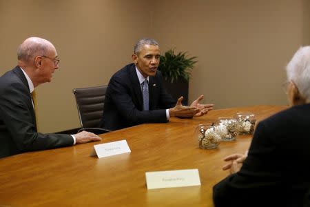 U.S. President Barack Obama meets with Mormon leaders of the Church of Jesus Christ of Latter-day Saints, including President Henry Eyring (L), at his hotel in Salt Lake City, Utah April 2, 2015. REUTERS/Jonathan Ernst