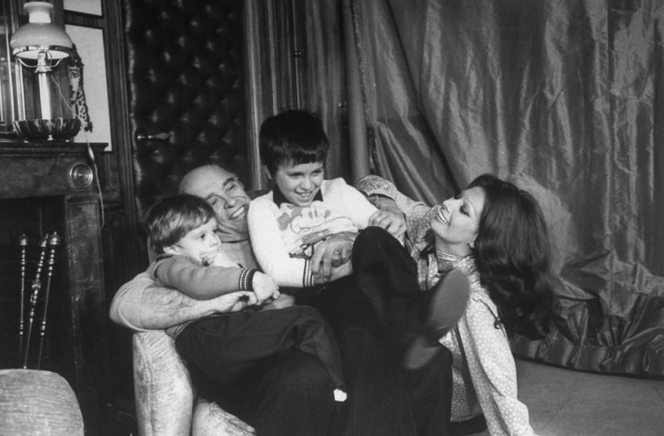 <p>Sophia Loren shares a laugh while spending a night at home with her husband, Carlo Ponti, and their two sons in 1976. </p>