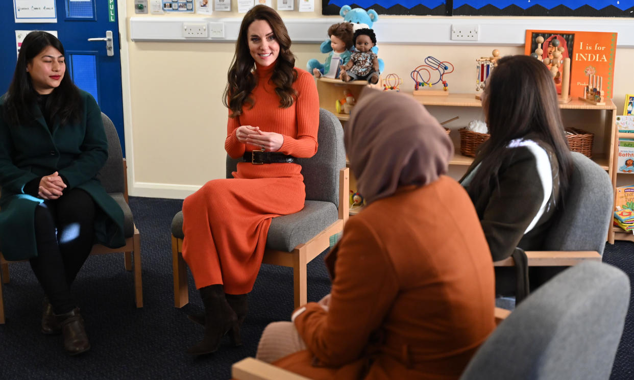 Princess of Wales talks with parents during her visit to Foxcubs Nursery