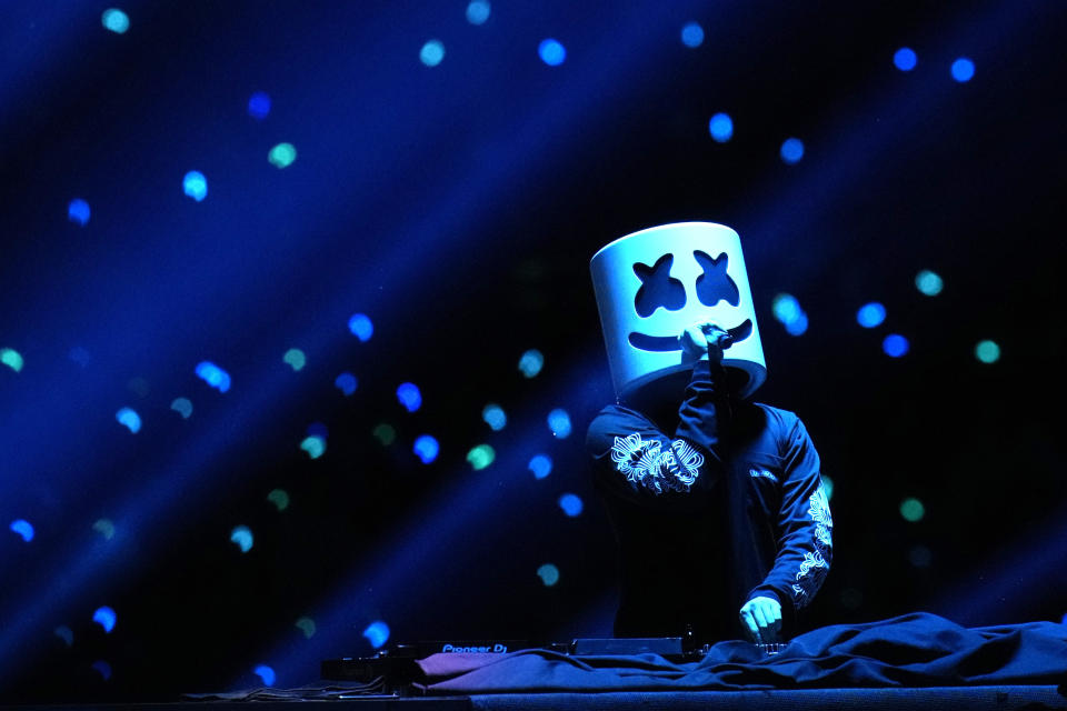 FILE - American DJ Marshmello performs at the Central American and Caribbean Games opening ceremony, at the Jorge "El Magico" Gonzalez stadium in San Salvador, El Salvador, June 23, 2023. A dip in violence has opened the door for the government of Nayib Bukele to host large events including the games and the upcoming Miss Universe pageant. (AP Photo/Arnulfo Franco, File)