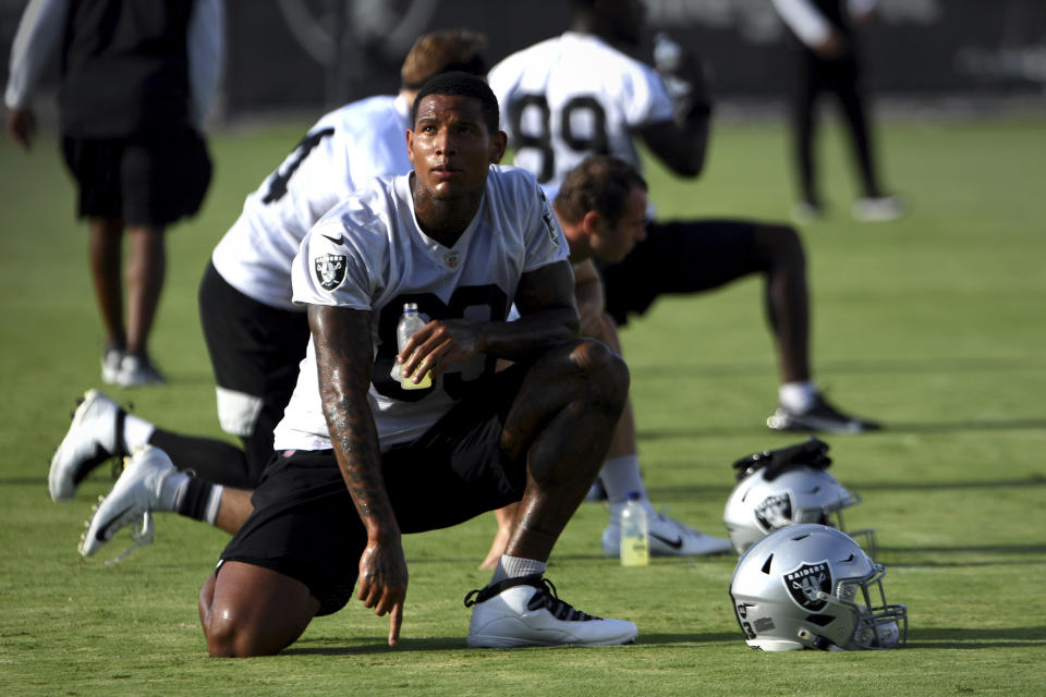 Las Vegas Raiders tight end Darren Waller warms up during an NFL football practice Saturday, July 31, 2021, in Henderson, Nev. (AP Photo/David Becker)