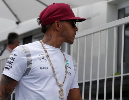 Formula One - Grand Prix of Europe - Baku, Azerbaijan - 17/6/16 - Mercedes Formula One driver Lewis Hamilton of Britain walks at the paddock area. REUTERS/Maxim Shemetov