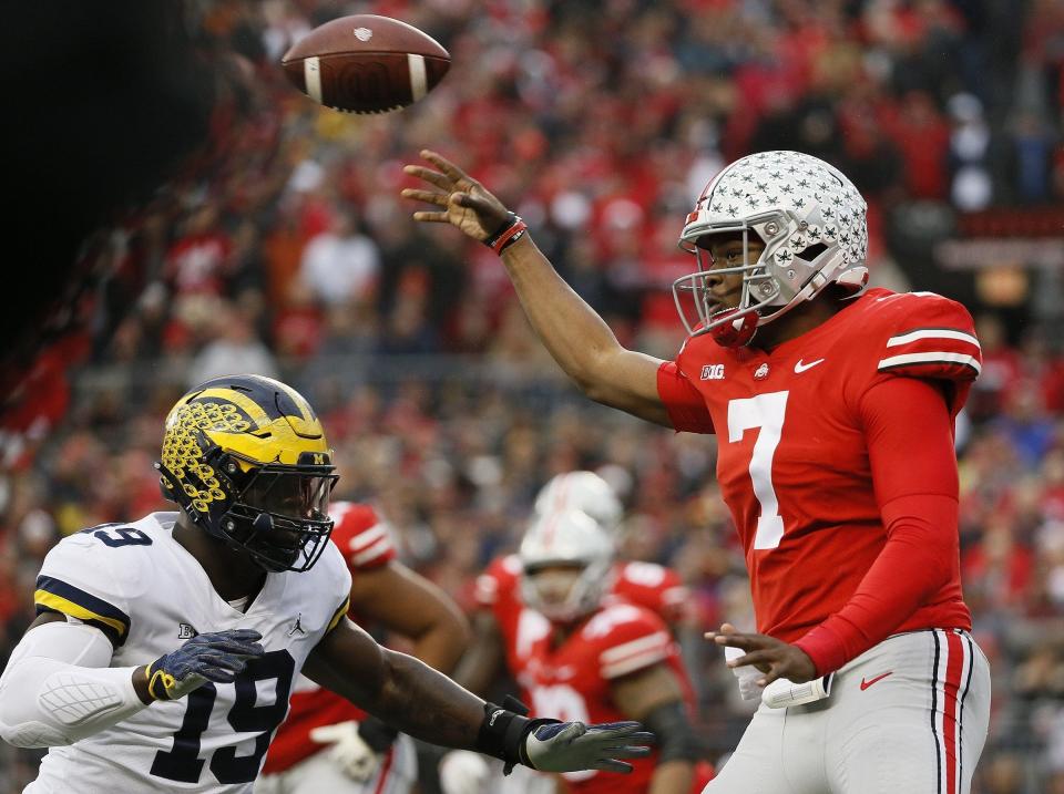 Ohio State Buckeyes quarterback Dwayne Haskins Jr. (7) drops back to pass during the first quarter of the NCAA football game against the Michigan Wolverines at Ohio Stadium in Columbus on Nov. 24, 2018.