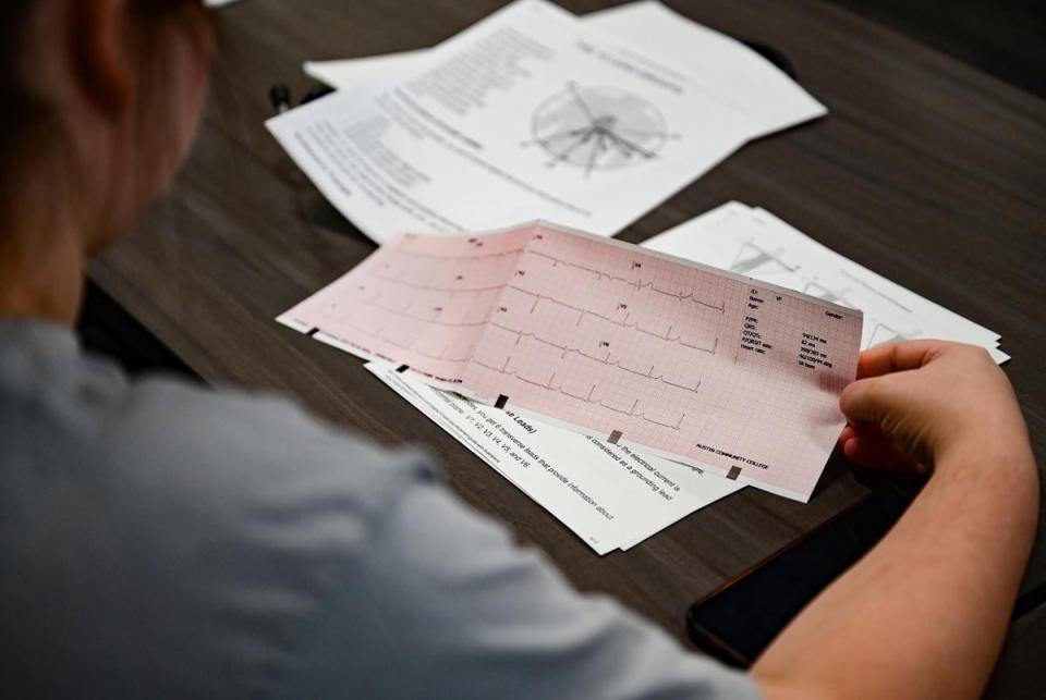 Mallory French examines the results of an EKG that she performed at Austin Community College’s Leander Campus on Oct. 4. French and other students were participating in a healthcare apprenticeship program for Baylor Scott & White employees.