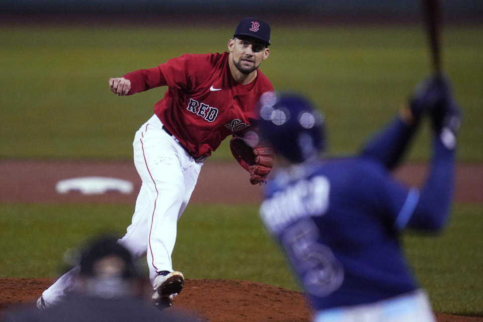 Boston Red Sox starting pitcher Nathan Eovaldi strikes out Tampa Bay Rays' Wander Franco during the first inning of a baseball game Tuesday, Oct. 4, 2022, at Fenway Park, in Boston. (AP Photo/Charles Krupa)