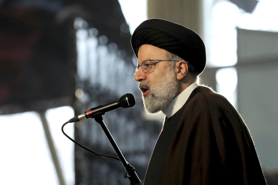 Ebrahim Raisi, Head of Iran's Judiciary, speaks during a ceremony on the occasion of first anniversary of death of late Iranian Revolutionary Guards Corps (IRGC) general and commander of the Quds Force Qasem Soleimani, in Tehran, Iran, Friday, Jan. 1, 2021. The top commander of Iran's paramilitary Revolutionary Guard said Friday that his country was fully prepared to respond to any U.S. military pressure, amid heightened tensions between Tehran and Washington in the waning days of President Donald Trump's administration. (AP Photo/Ebrahim Noroozi)