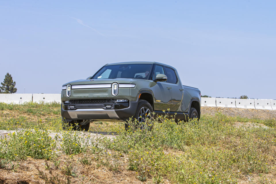 This photo, provided by Edmunds, shows the 2022 Rivian R1T. It is an all-electric pickup truck with an EPA-estimated range of 314 miles in its initial configuration. (Rex Tokeshi-Torres/Courtesy of Edmunds via AP)