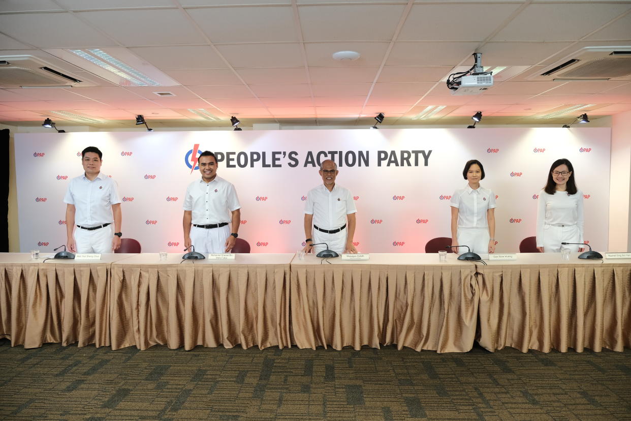 PAP vice-chairman Masagos Zulkifli (centre) unveils four new party candidates for the upcoming General Election: (from left) Alex Yeo, Sharael Taha, Gan Siow Huang and Rachel Ong. (PHOTO: PAP)