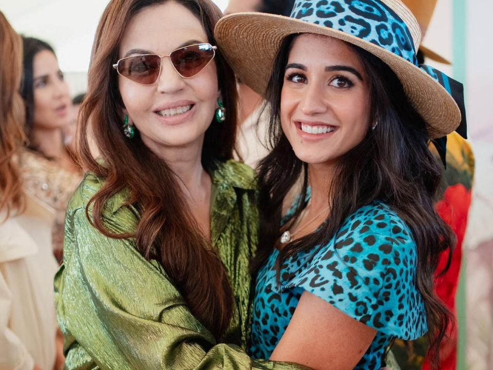 Radhika Merchant (right) hugs her future mother-in-law, Nita Ambani, the wife of Mukesh Ambani during the pre-wedding celebrations on March 2, 2024.